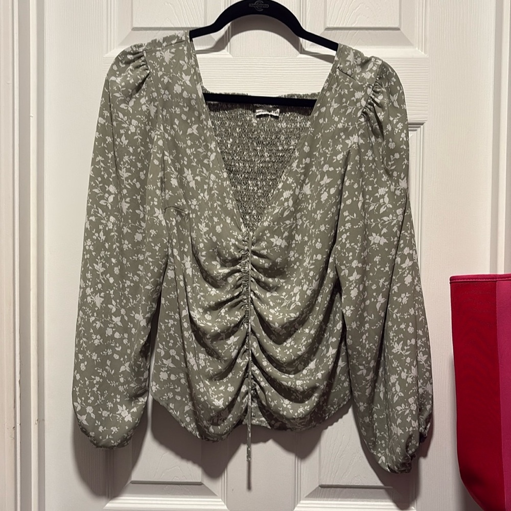 Green and white blouse